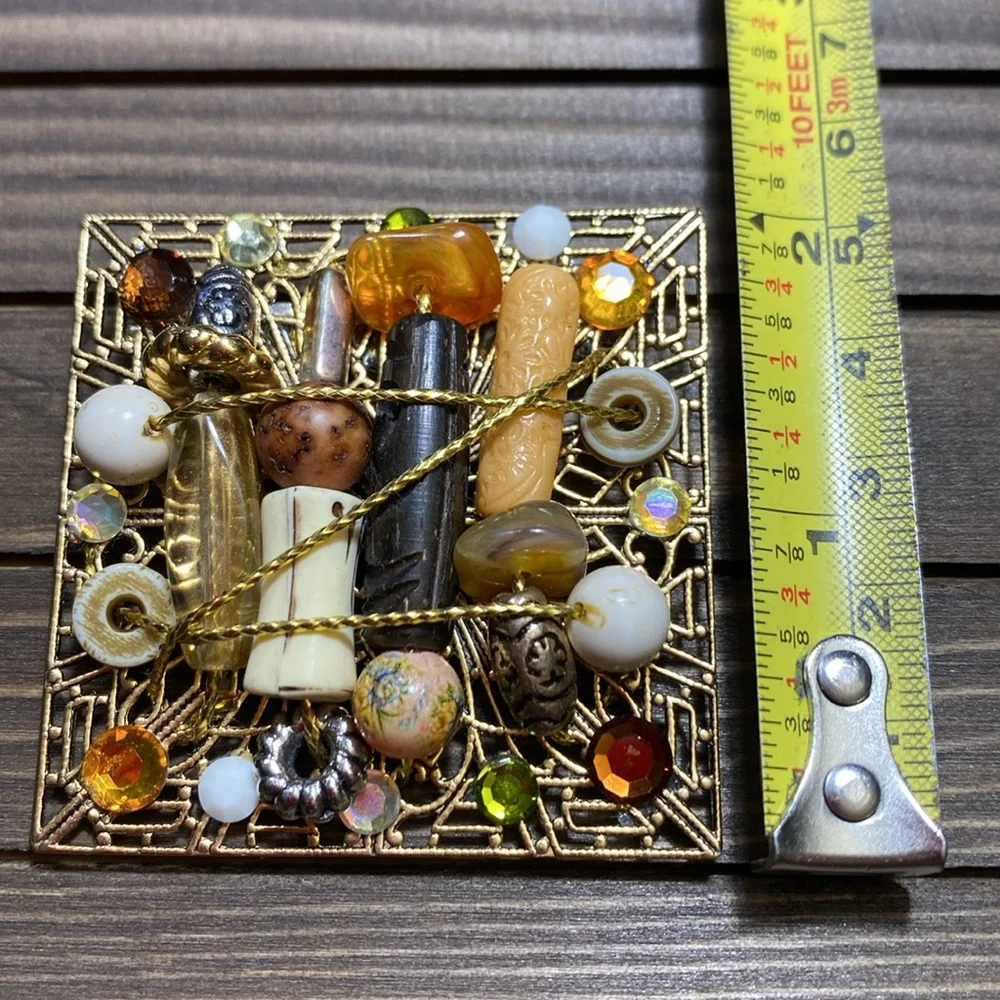 Vintage gold-tone collage brooch featuring various beads and gemstones - Picture 5 of 8